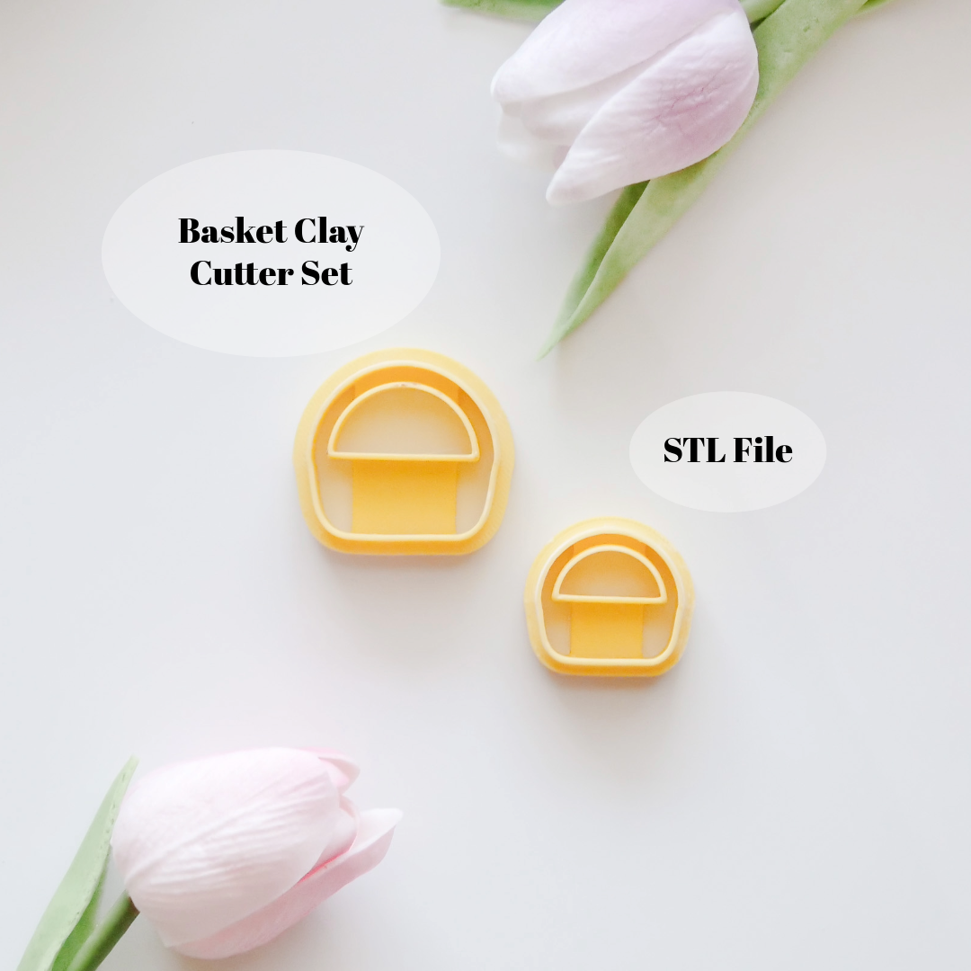 Two yellow Basket Polymer Clay Cutter shapes from Hello Cutters Basket Polymer Clay Cutter STL Set rest on a white surface with two pink tulips. Text bubbles label them as Basket Polymer Clay Cutter STL Set and digital download STL file.